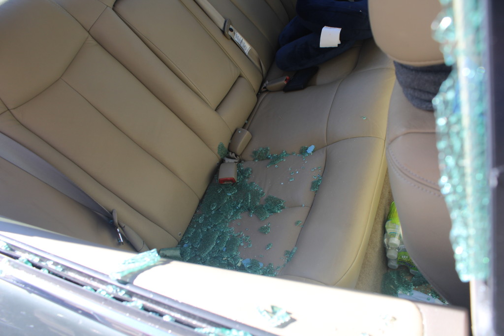 Broken glass everywhere. Lesson learned: Do not leave anything inside your car--- bags, keys, pouch, et cetera. They might arouse the curiousity of the thief.