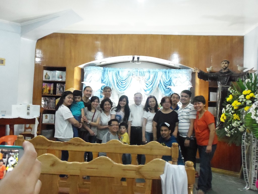 With family and friends in front of her casket during the week of viewing.